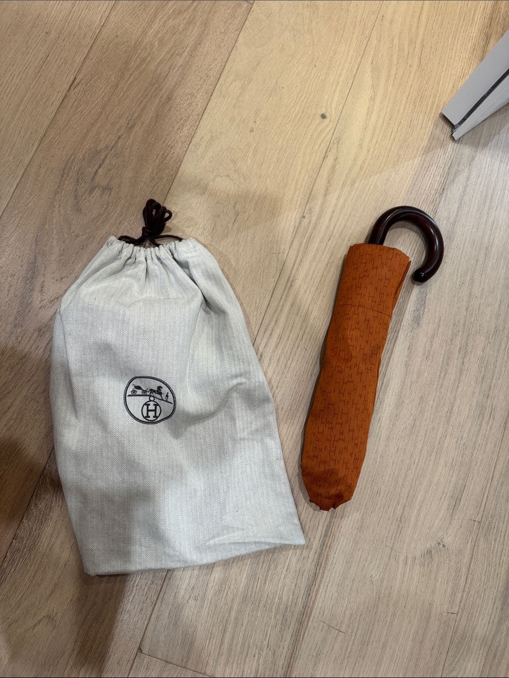 Hermes Orange Patterned Compact Umbrella with Brown Handle